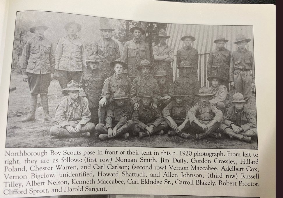 About two dozen Northborough Boy Scouts posed in front of their tent, circa 1920